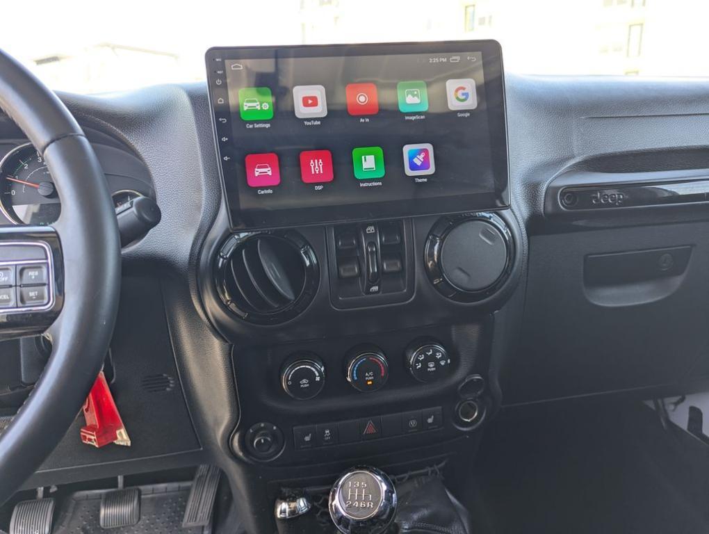 used 2015 Jeep Wrangler Unlimited car, priced at $19,677