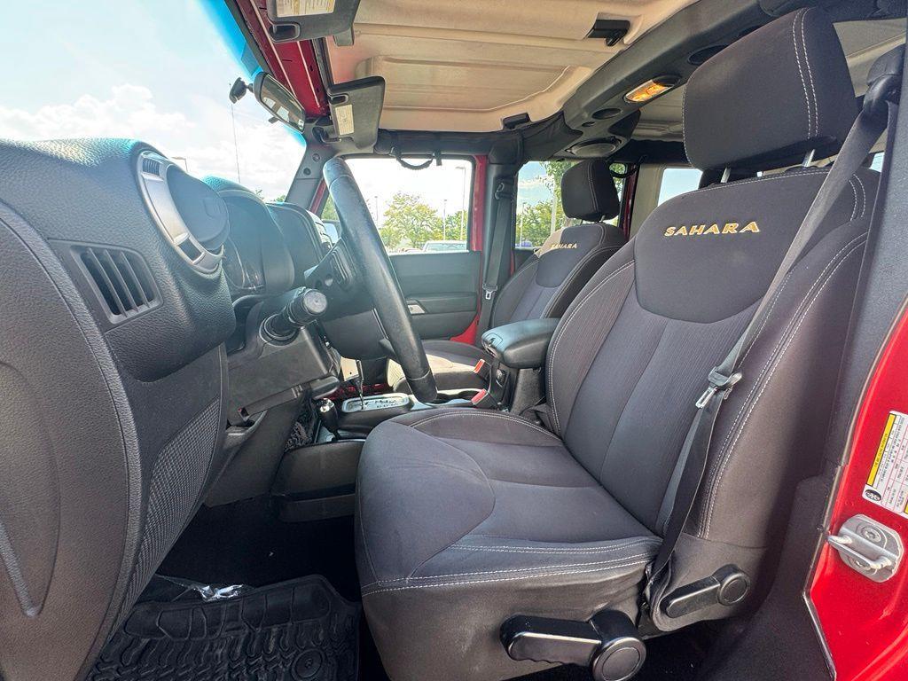 used 2014 Jeep Wrangler Unlimited car, priced at $14,673