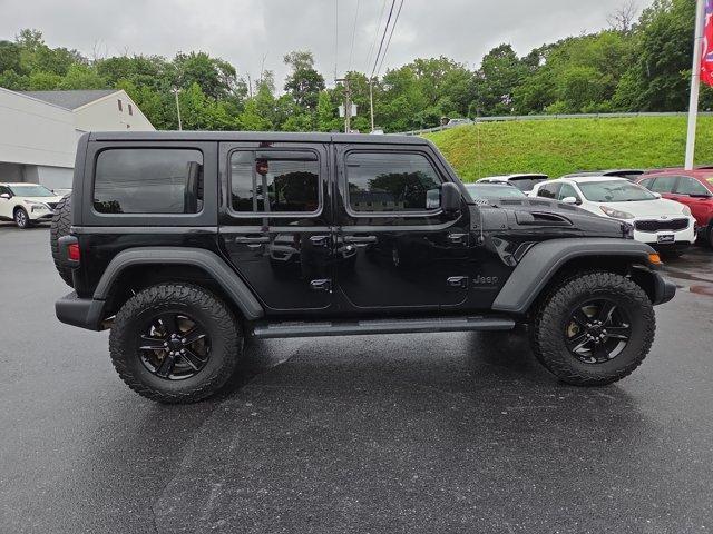used 2021 Jeep Wrangler Unlimited car, priced at $27,845