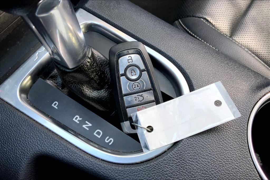 used 2021 Ford Mustang car, priced at $18,597