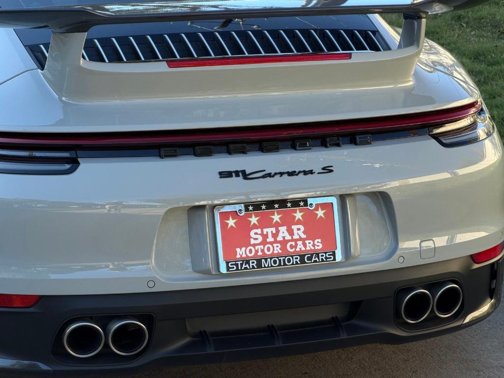 used 2023 Porsche 911 car, priced at $149,440
