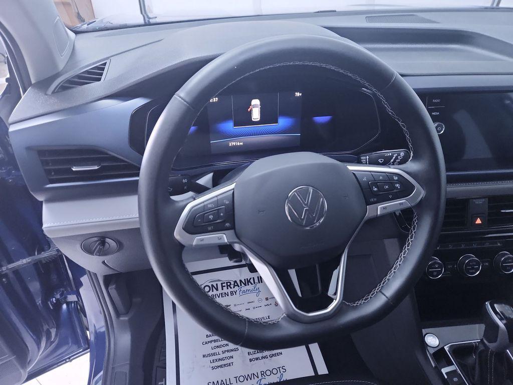 used 2024 Volkswagen Taos car, priced at $22,890
