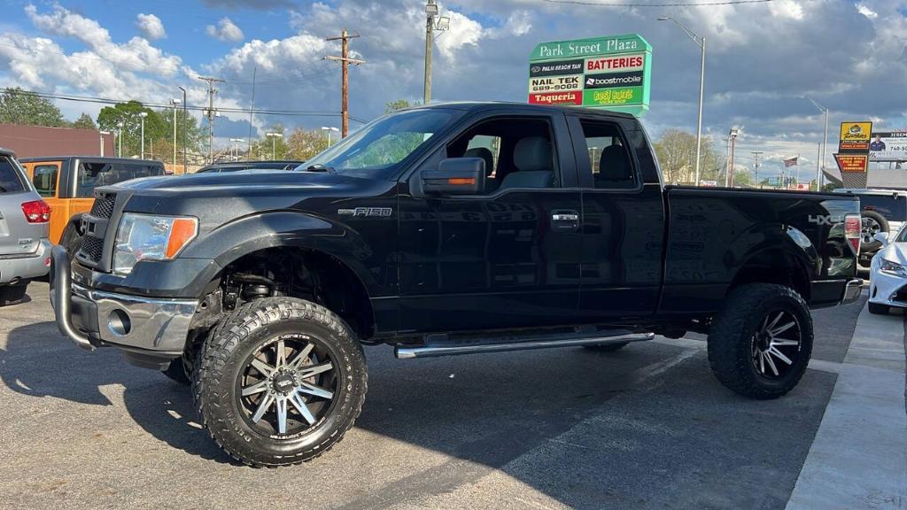 used 2014 Ford F-150 car, priced at $18,900