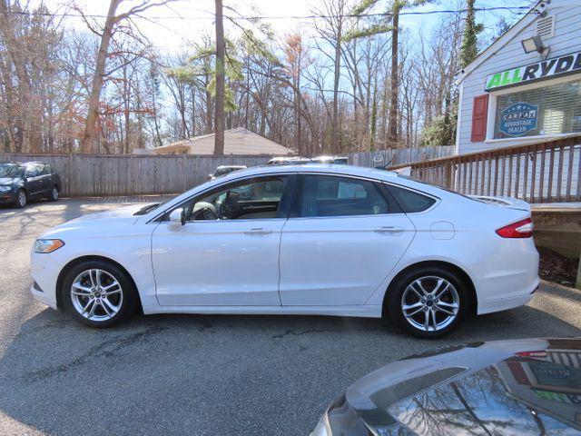 used 2016 Ford Fusion Hybrid car, priced at $4,999