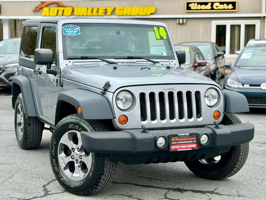 used 2014 Jeep Wrangler car, priced at $13,990