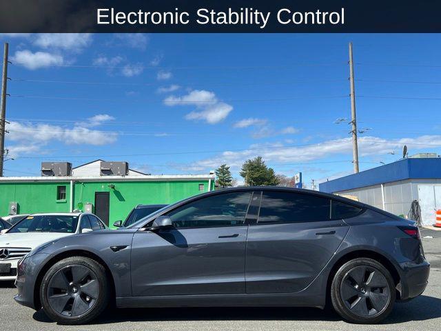used 2023 Tesla Model 3 car, priced at $28,900
