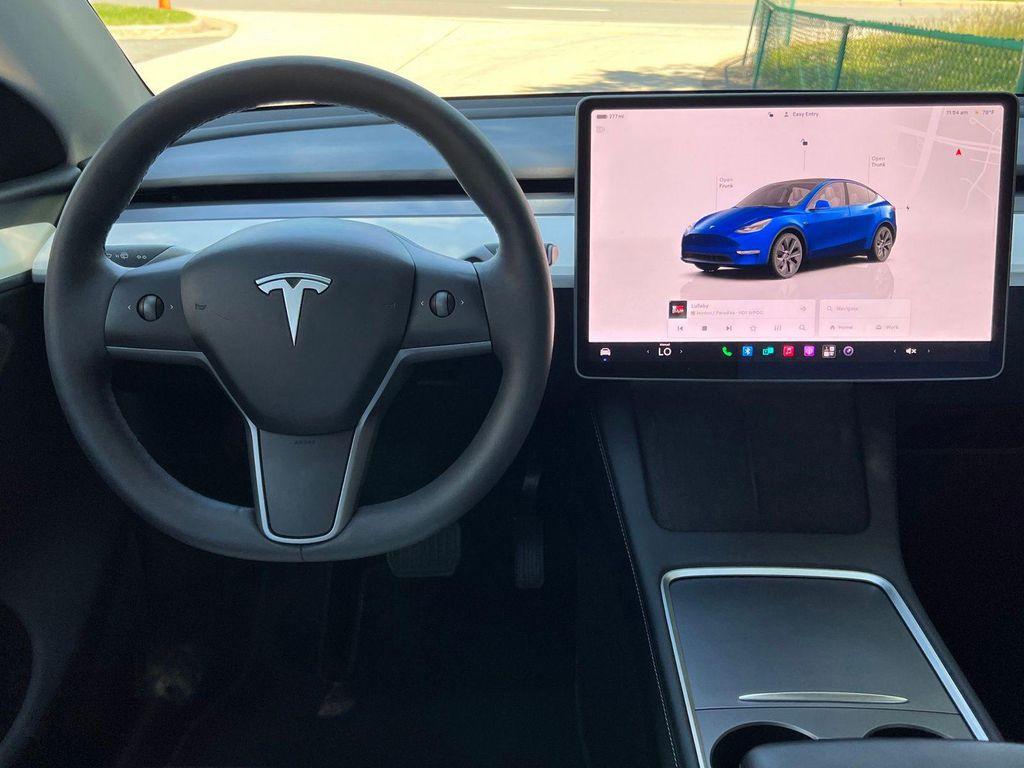 used 2023 Tesla Model Y car, priced at $30,495