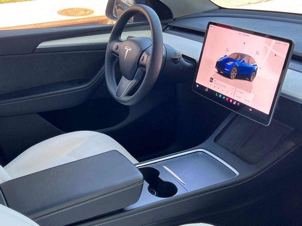 used 2023 Tesla Model Y car, priced at $30,495