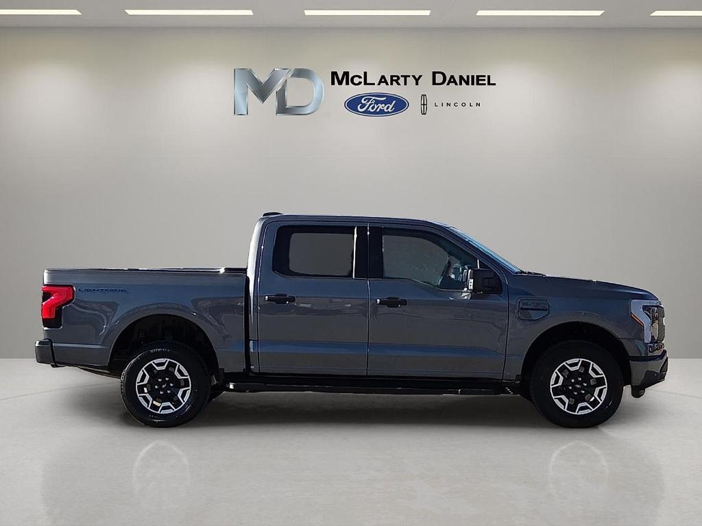 used 2023 Ford F-150 Lightning car, priced at $38,275