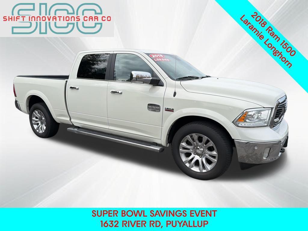 used 2018 Ram 1500 car, priced at $26,715