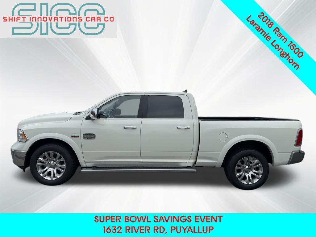 used 2018 Ram 1500 car, priced at $26,715