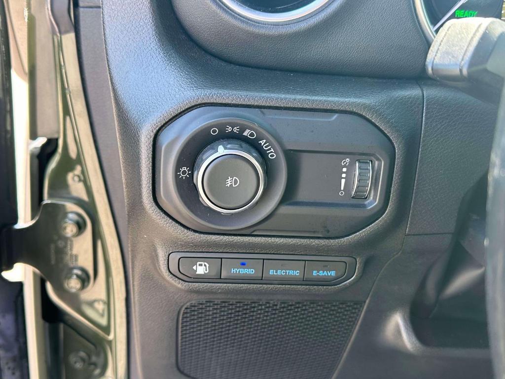 used 2023 Jeep Wrangler 4xe car, priced at $31,940