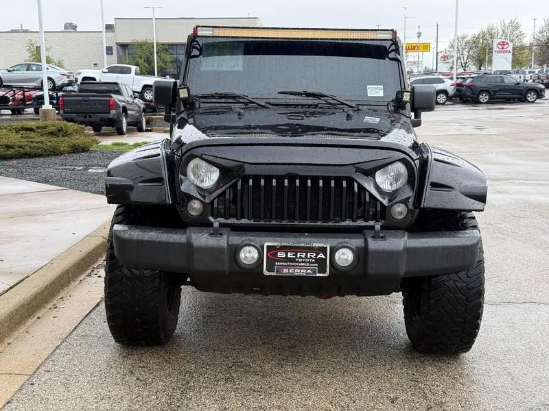 used 2014 Jeep Wrangler Unlimited car, priced at $19,592
