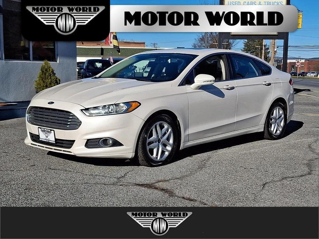 used 2014 Ford Fusion car, priced at $7,599