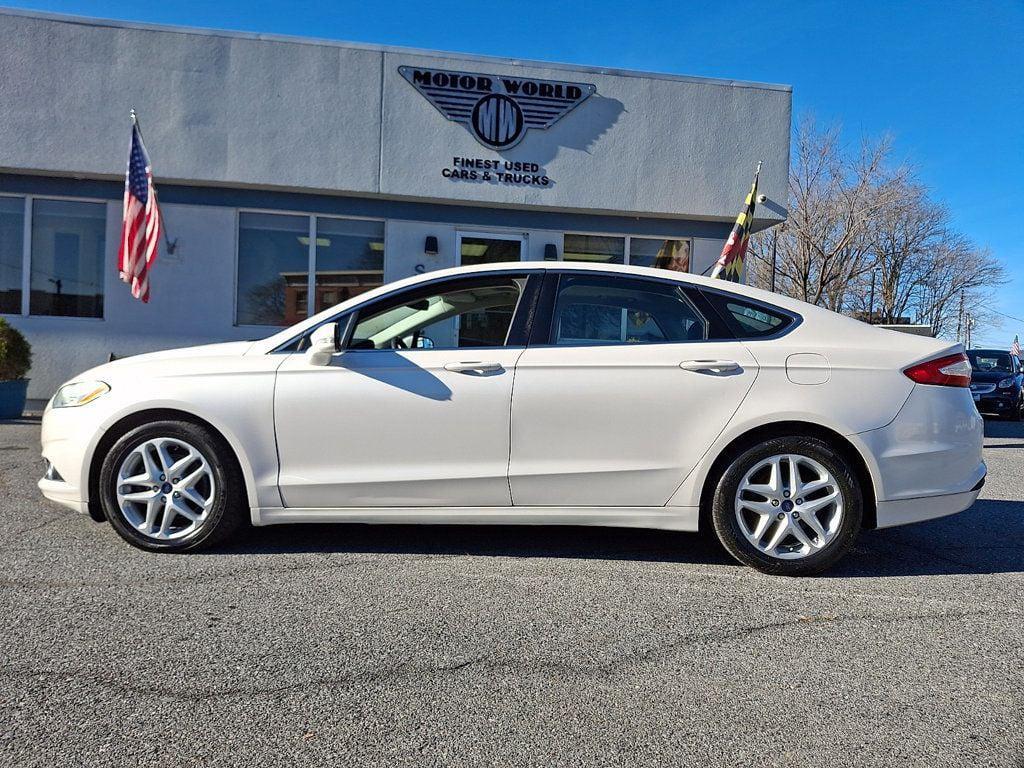 used 2014 Ford Fusion car, priced at $7,599