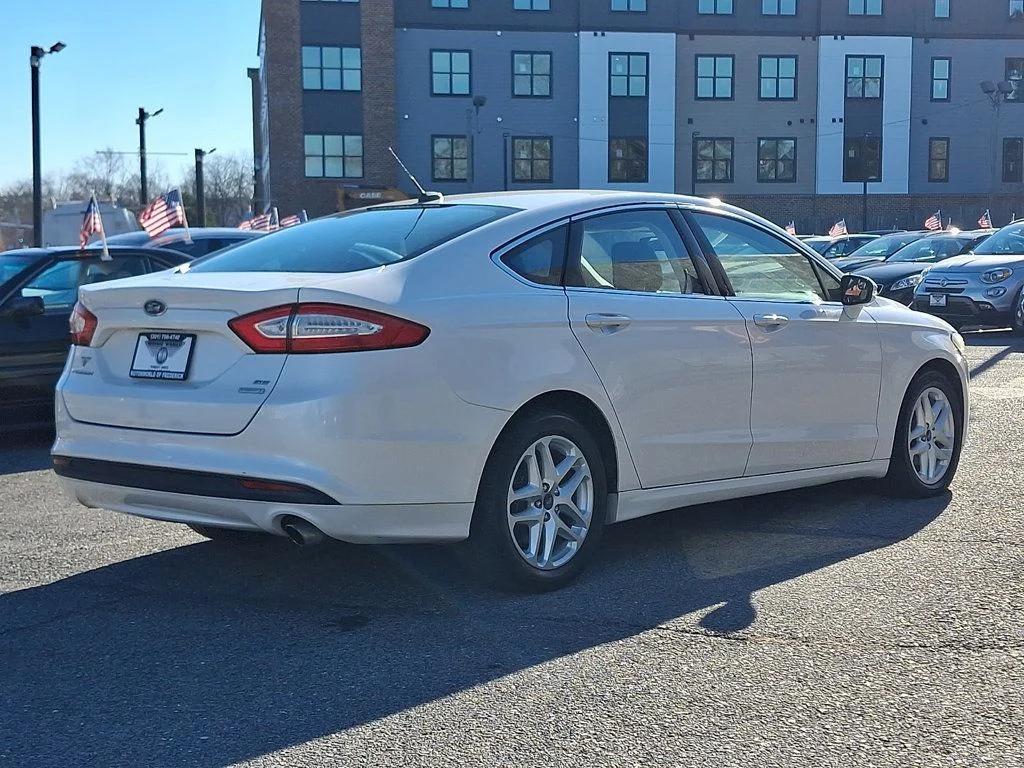 used 2014 Ford Fusion car, priced at $7,599