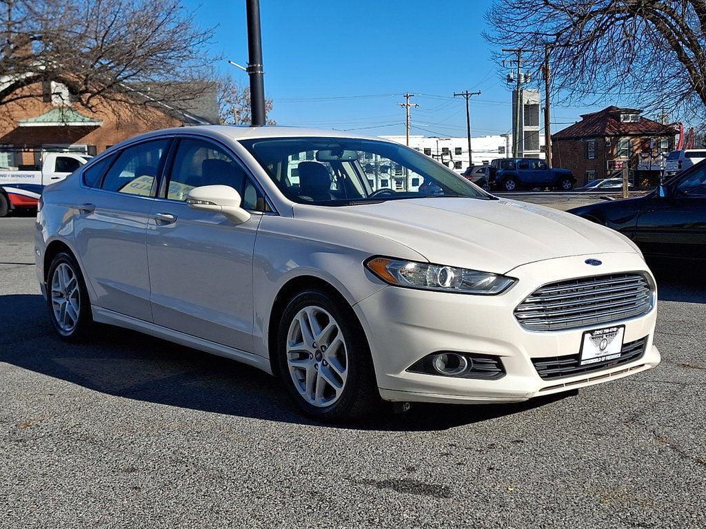 used 2014 Ford Fusion car, priced at $7,599