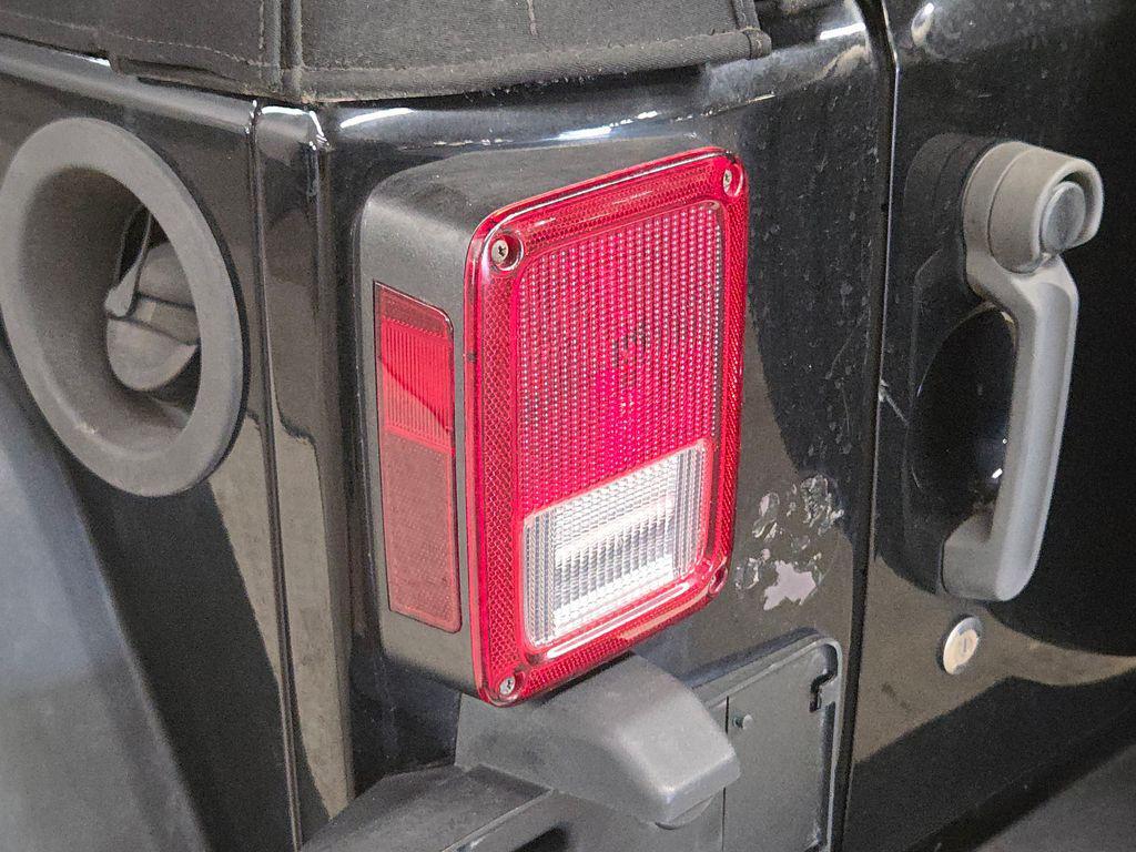 used 2013 Jeep Wrangler Unlimited car, priced at $13,495