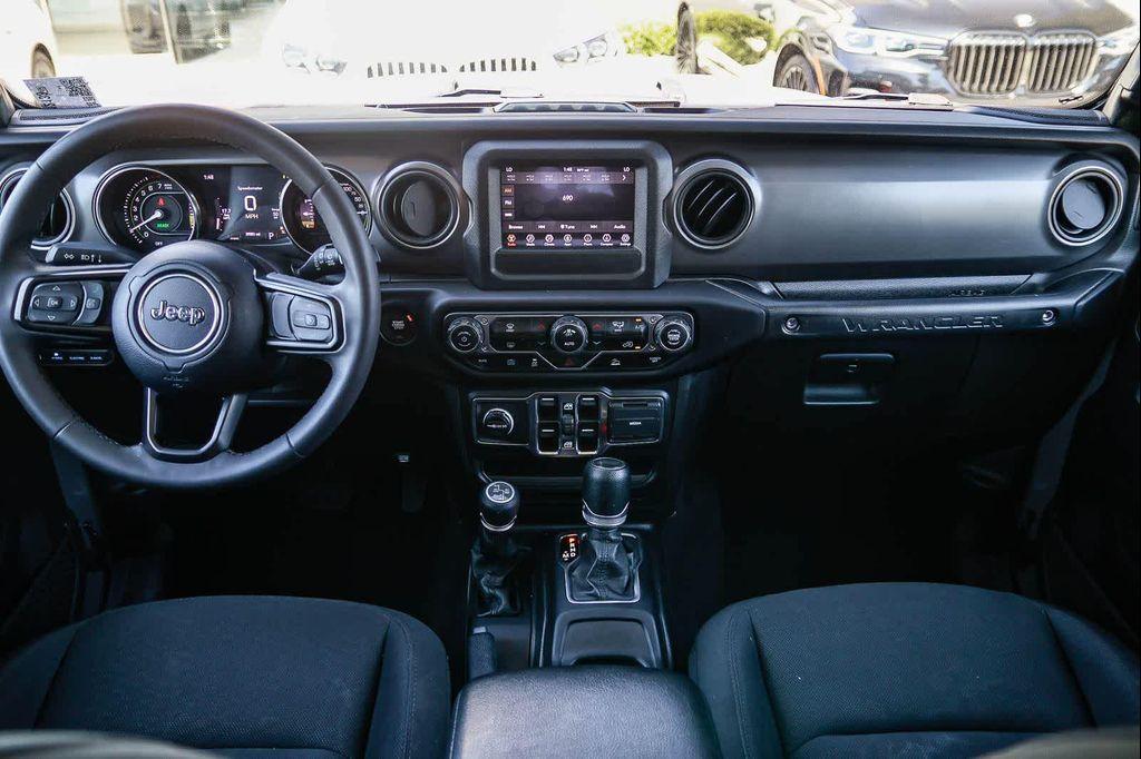 used 2023 Jeep Wrangler 4xe car, priced at $27,225