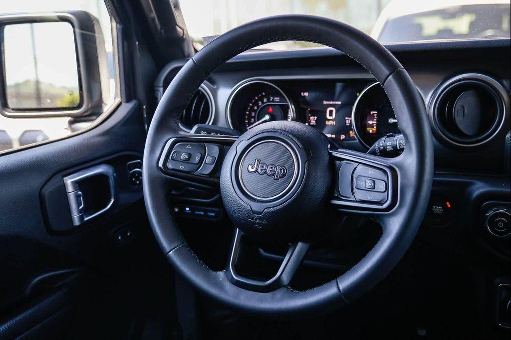 used 2023 Jeep Wrangler 4xe car, priced at $27,225