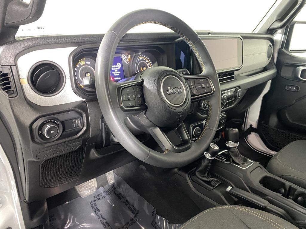 used 2024 Jeep Wrangler car, priced at $29,385