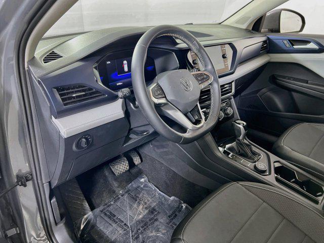 used 2023 Volkswagen Taos car, priced at $25,392