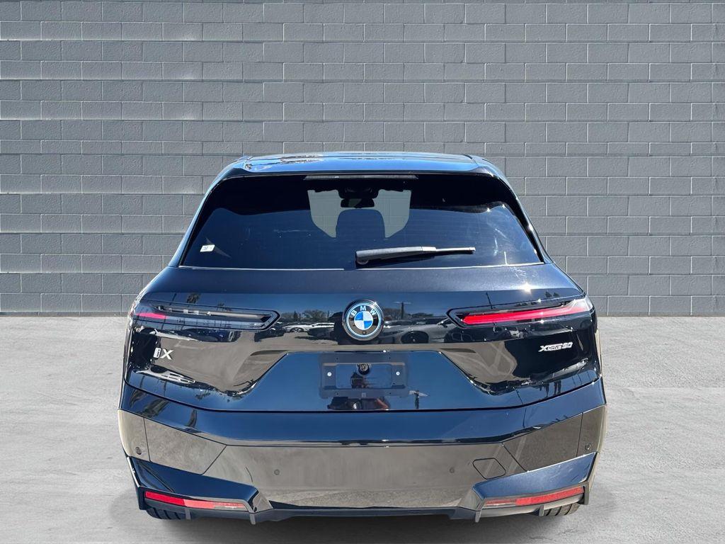 used 2025 BMW iX car, priced at $55,880