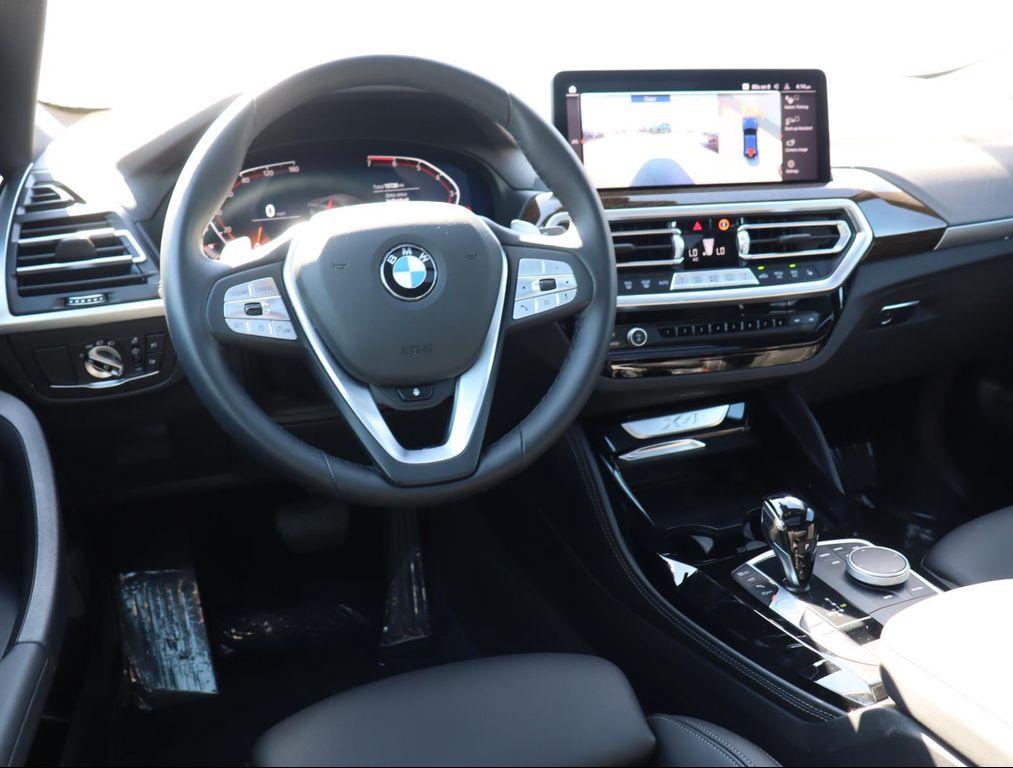 used 2024 BMW X4 car, priced at $40,850