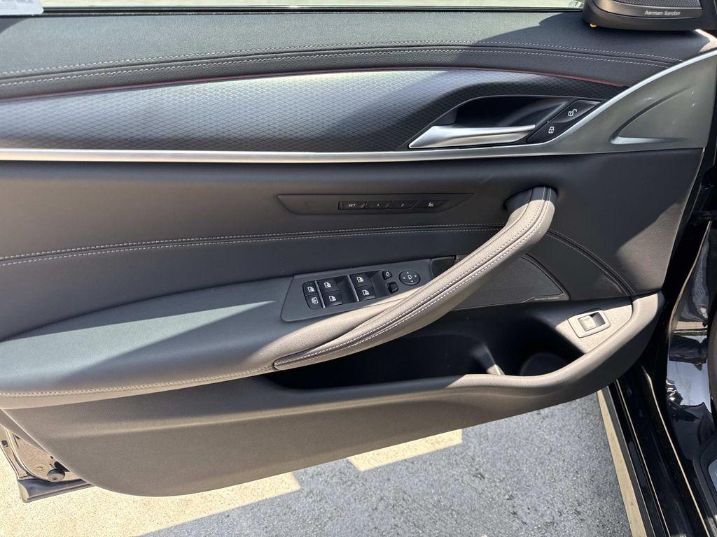 used 2023 BMW M550 car, priced at $63,880