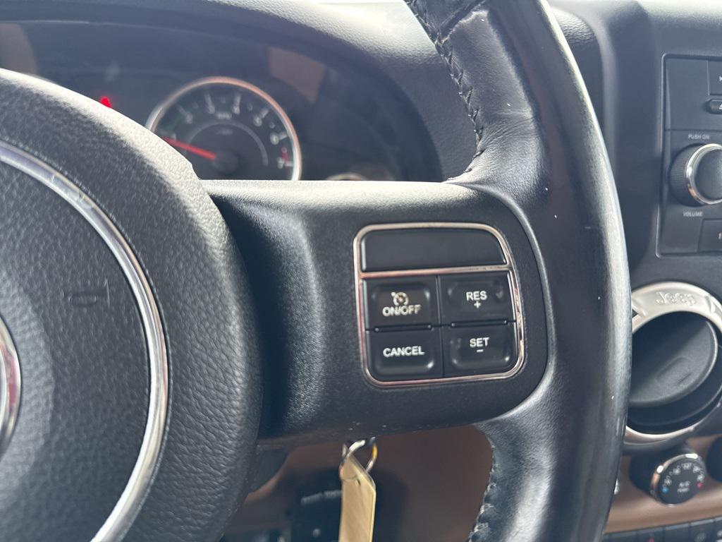 used 2012 Jeep Wrangler Unlimited car, priced at $14,295