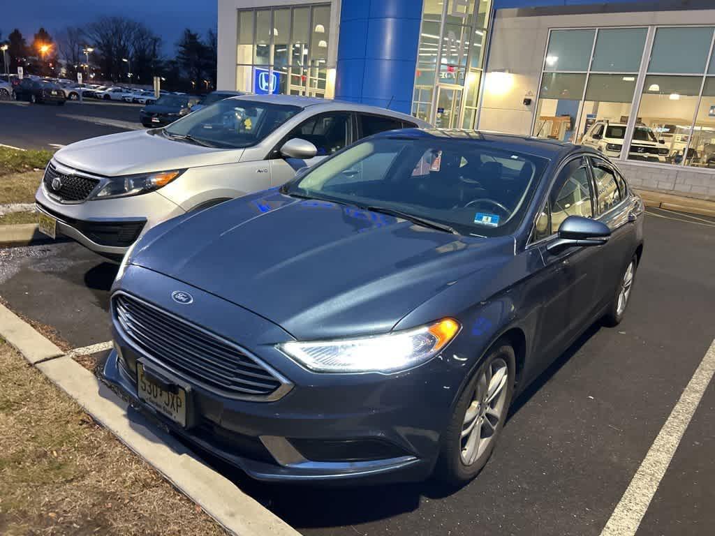 used 2018 Ford Fusion car, priced at $10,300