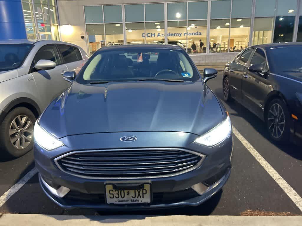 used 2018 Ford Fusion car, priced at $10,300
