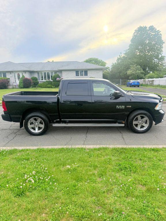used 2014 Ram 1500 car, priced at $9,999