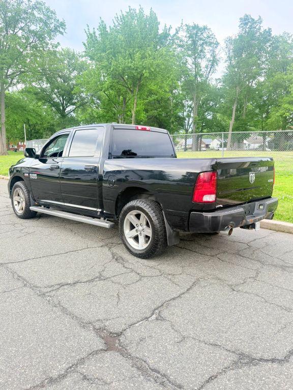 used 2014 Ram 1500 car, priced at $9,999