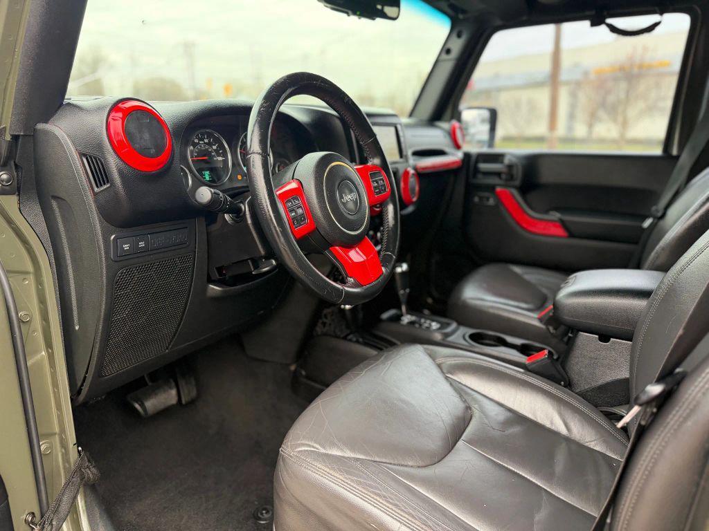 used 2015 Jeep Wrangler Unlimited car, priced at $13,495