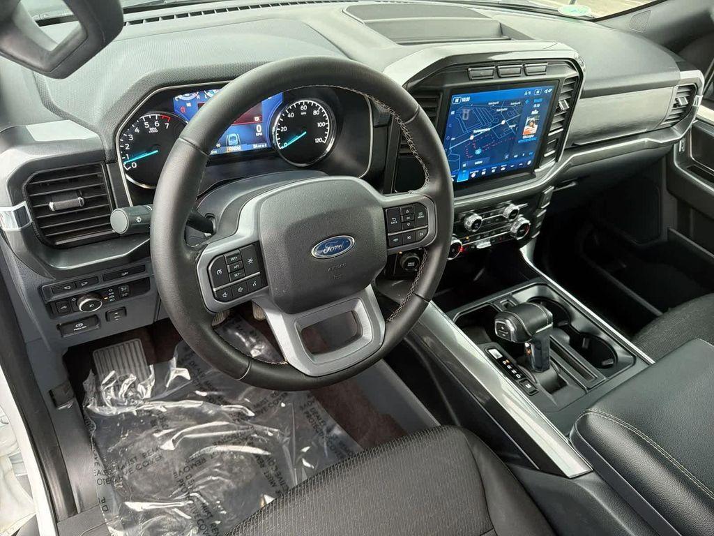 used 2023 Ford F-150 car, priced at $39,077