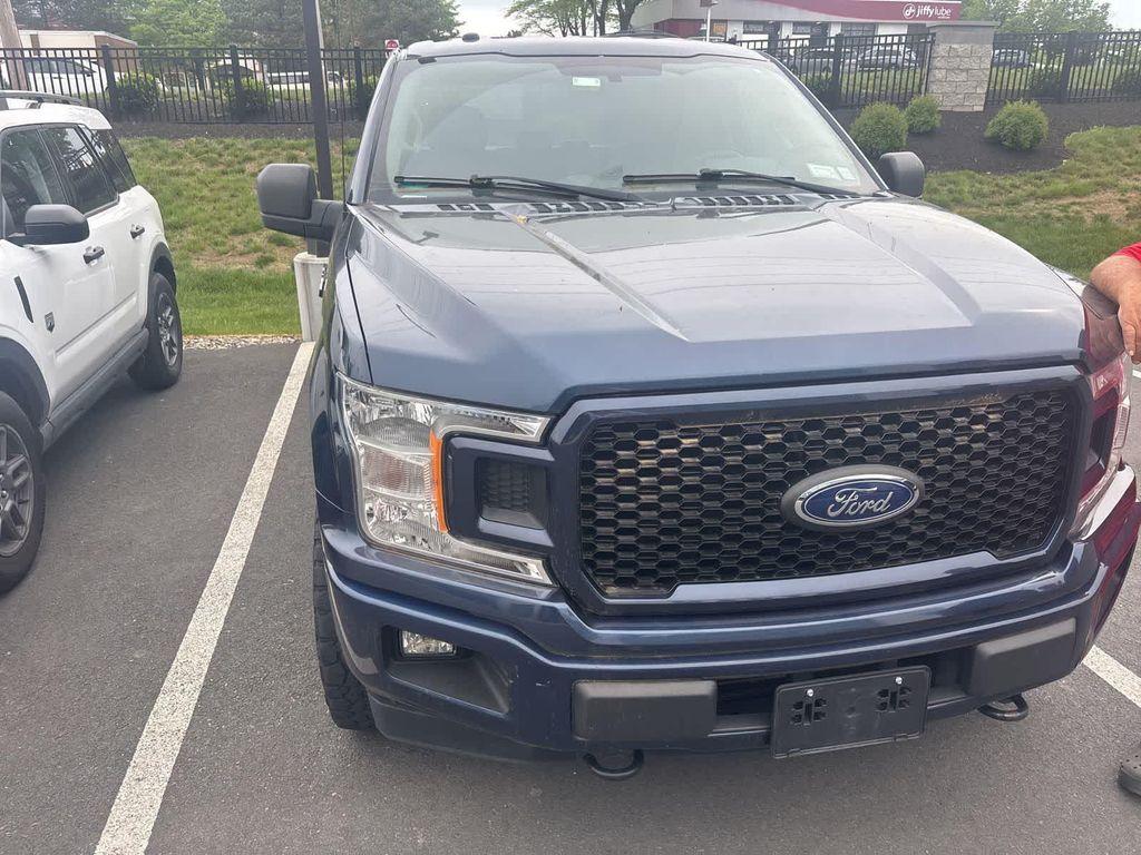 used 2018 Ford F-150 car, priced at $24,140