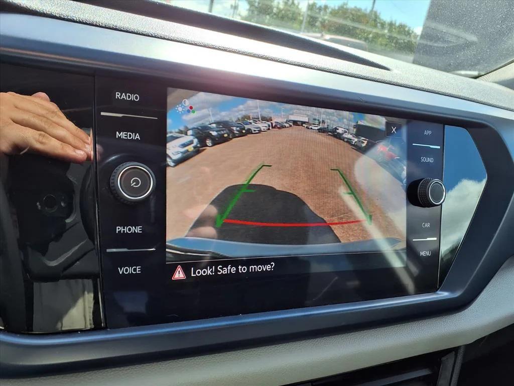 used 2023 Volkswagen Taos car, priced at $18,400