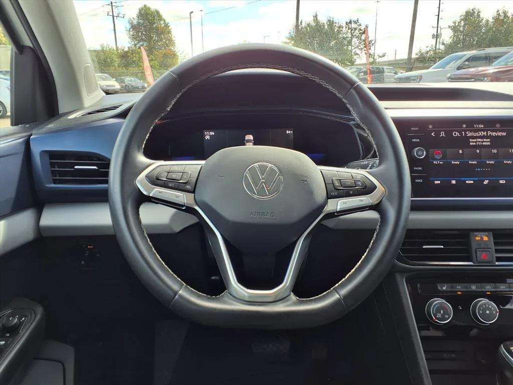 used 2023 Volkswagen Taos car, priced at $18,400