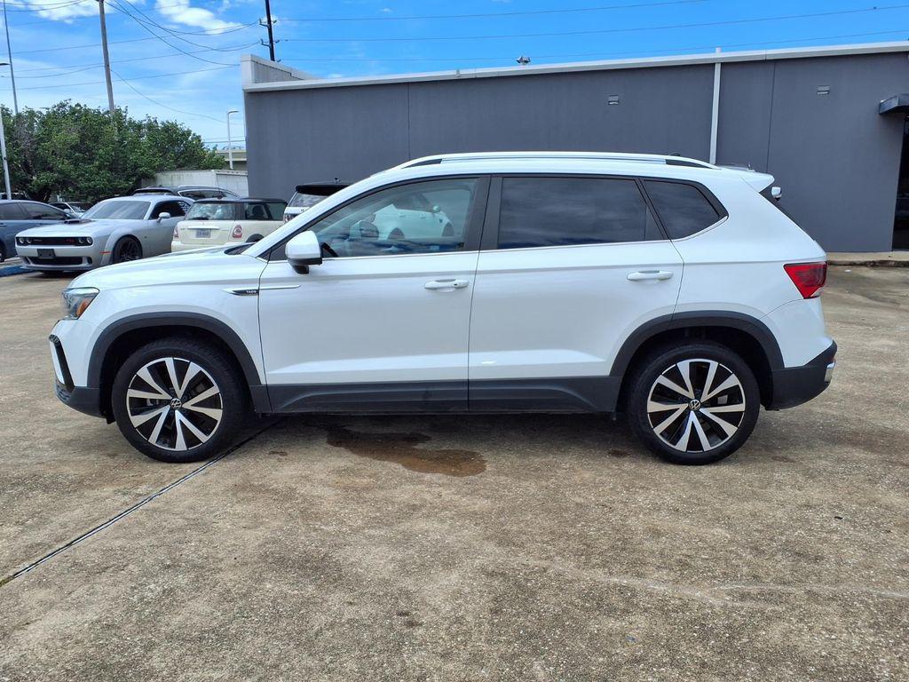 used 2023 Volkswagen Taos car, priced at $18,400
