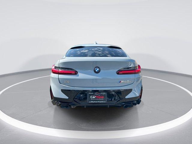 used 2024 BMW X4 car, priced at $58,294