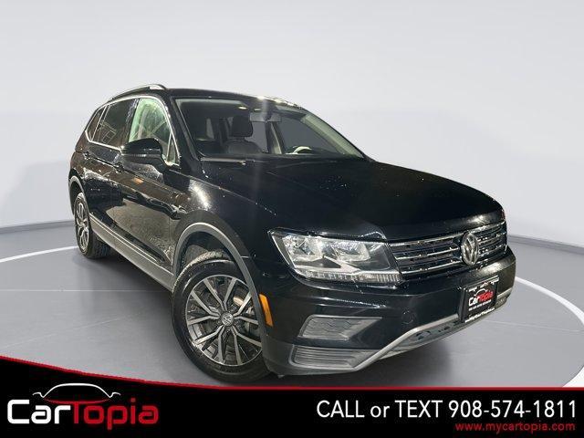used 2021 Volkswagen Tiguan car, priced at $13,997