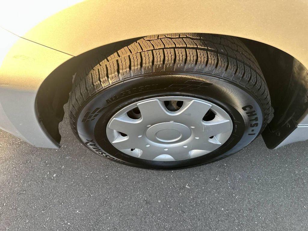 used 2014 Nissan Quest car, priced at $5,000