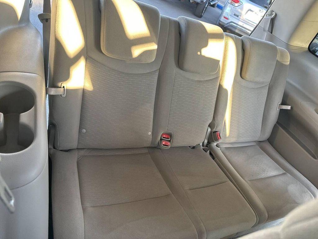 used 2014 Nissan Quest car, priced at $5,000