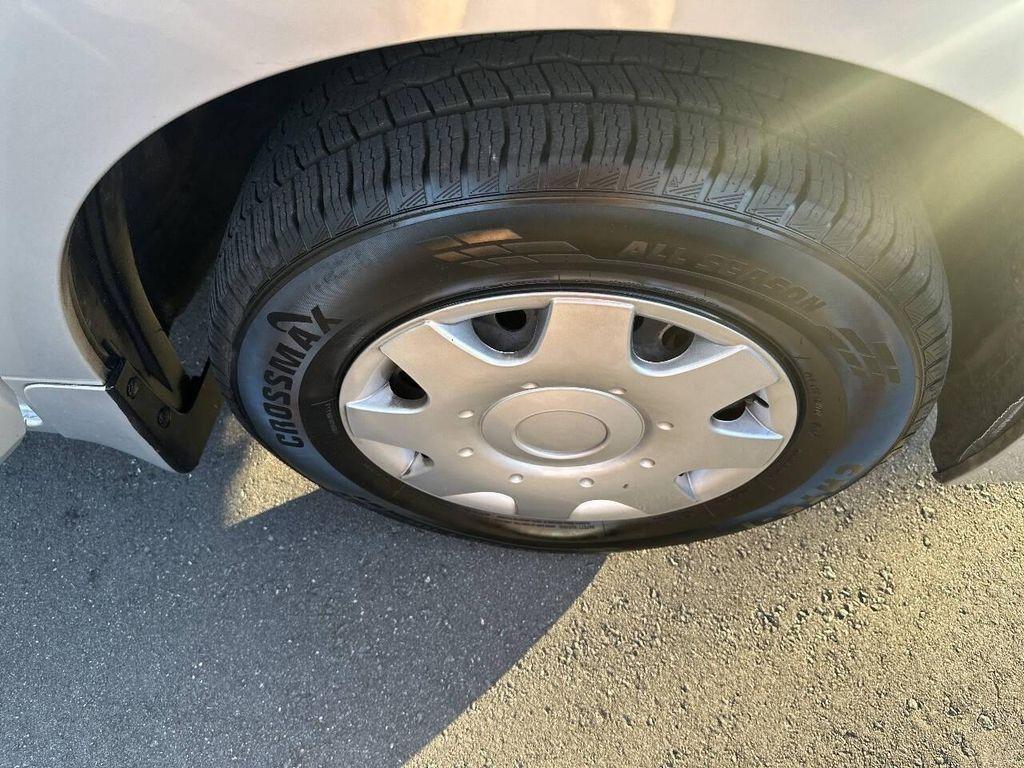 used 2014 Nissan Quest car, priced at $5,000