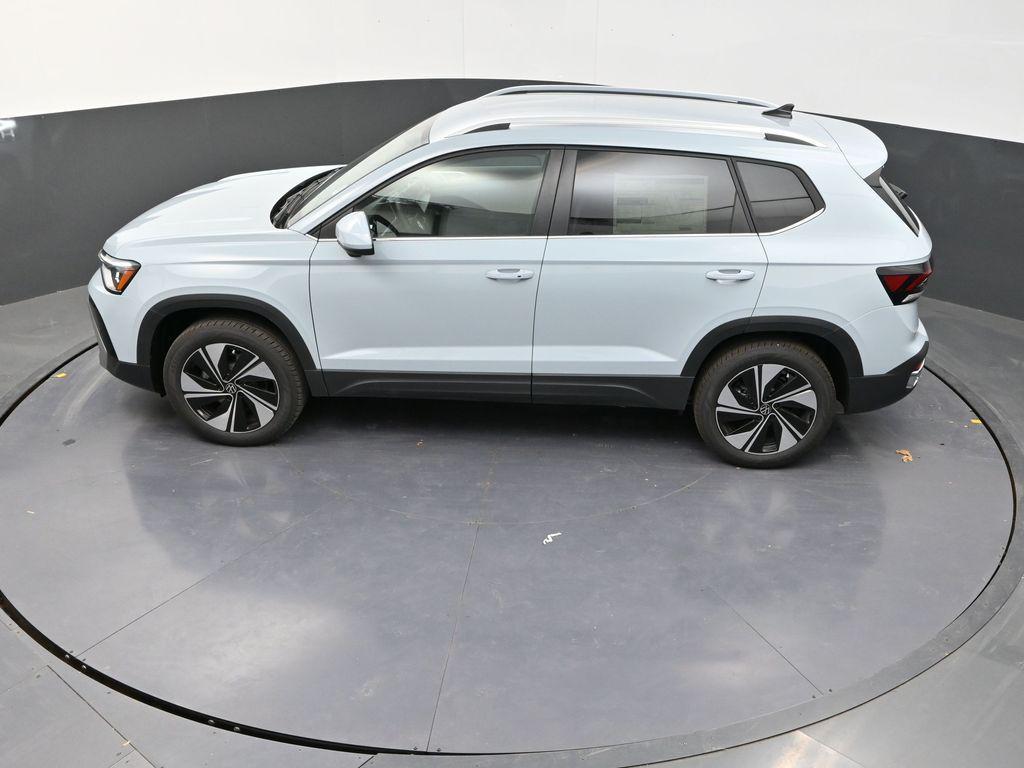 used 2025 Volkswagen Taos car, priced at $25,000