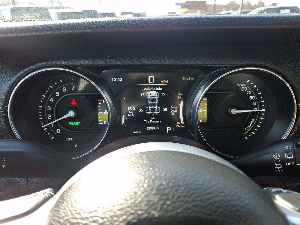 used 2023 Jeep Wrangler 4xe car, priced at $33,738