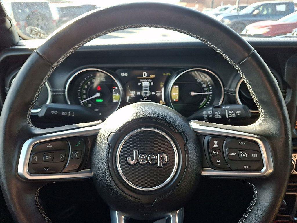used 2023 Jeep Wrangler 4xe car, priced at $33,738