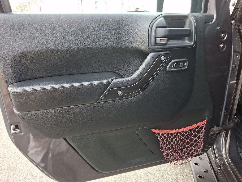 used 2018 Jeep Wrangler JK Unlimited car, priced at $23,581