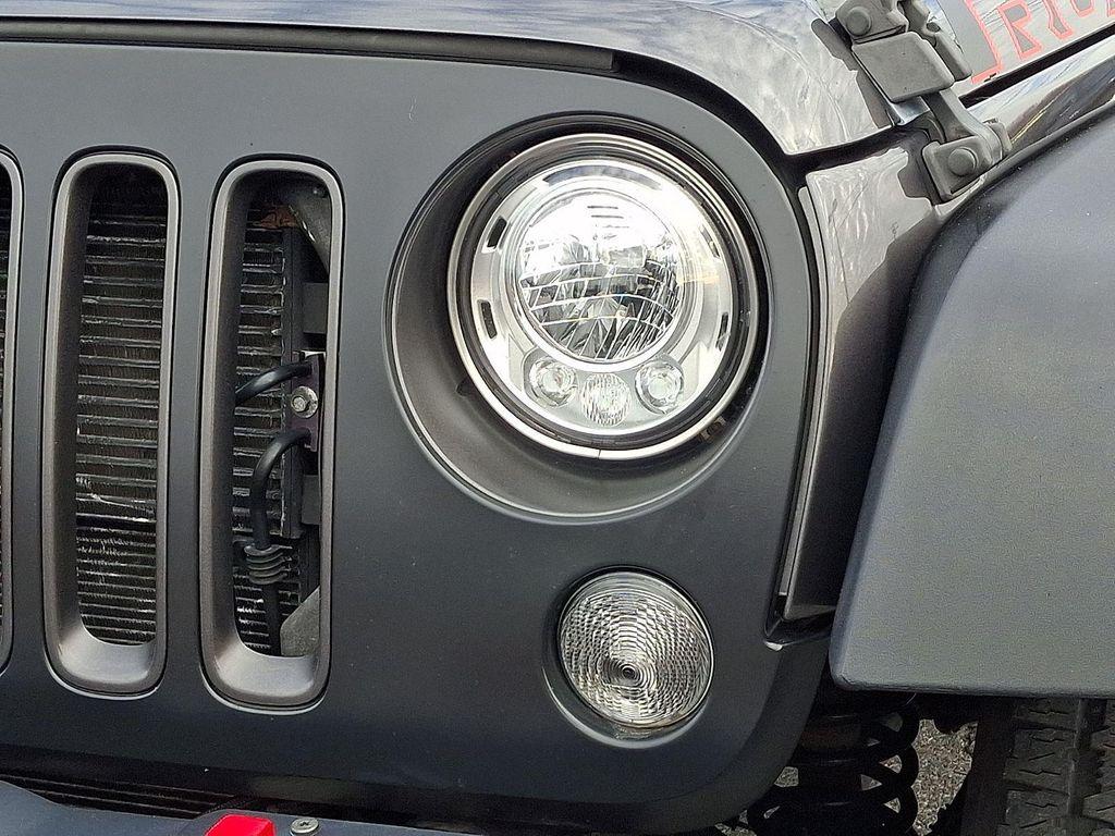 used 2018 Jeep Wrangler JK Unlimited car, priced at $23,581